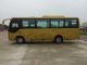 Un bus di 30 passeggeri, mini navetta facente un giro turistico Cummins Engine della direzione del ower del bus fornitore