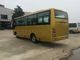 Un bus di 30 passeggeri, mini navetta facente un giro turistico Cummins Engine della direzione del ower del bus fornitore